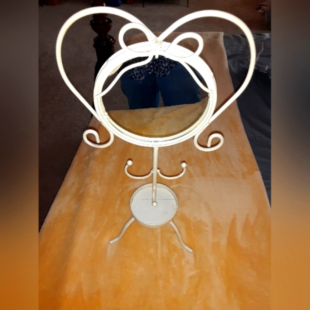 Meta mirror stand that also holds jewelry